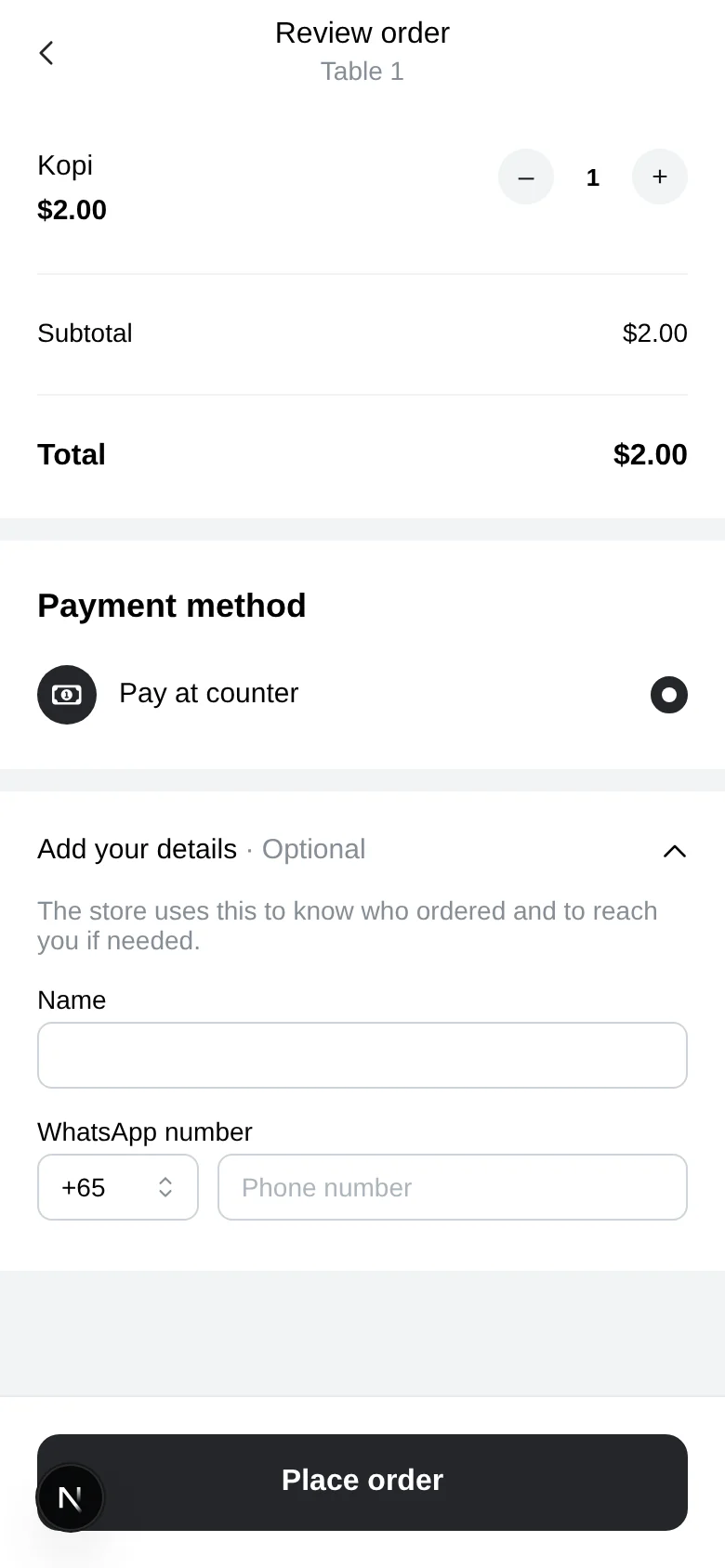 A table QR review screen headed Table 1, with an Add your details section open showing optional name and WhatsApp number fields above Place order
